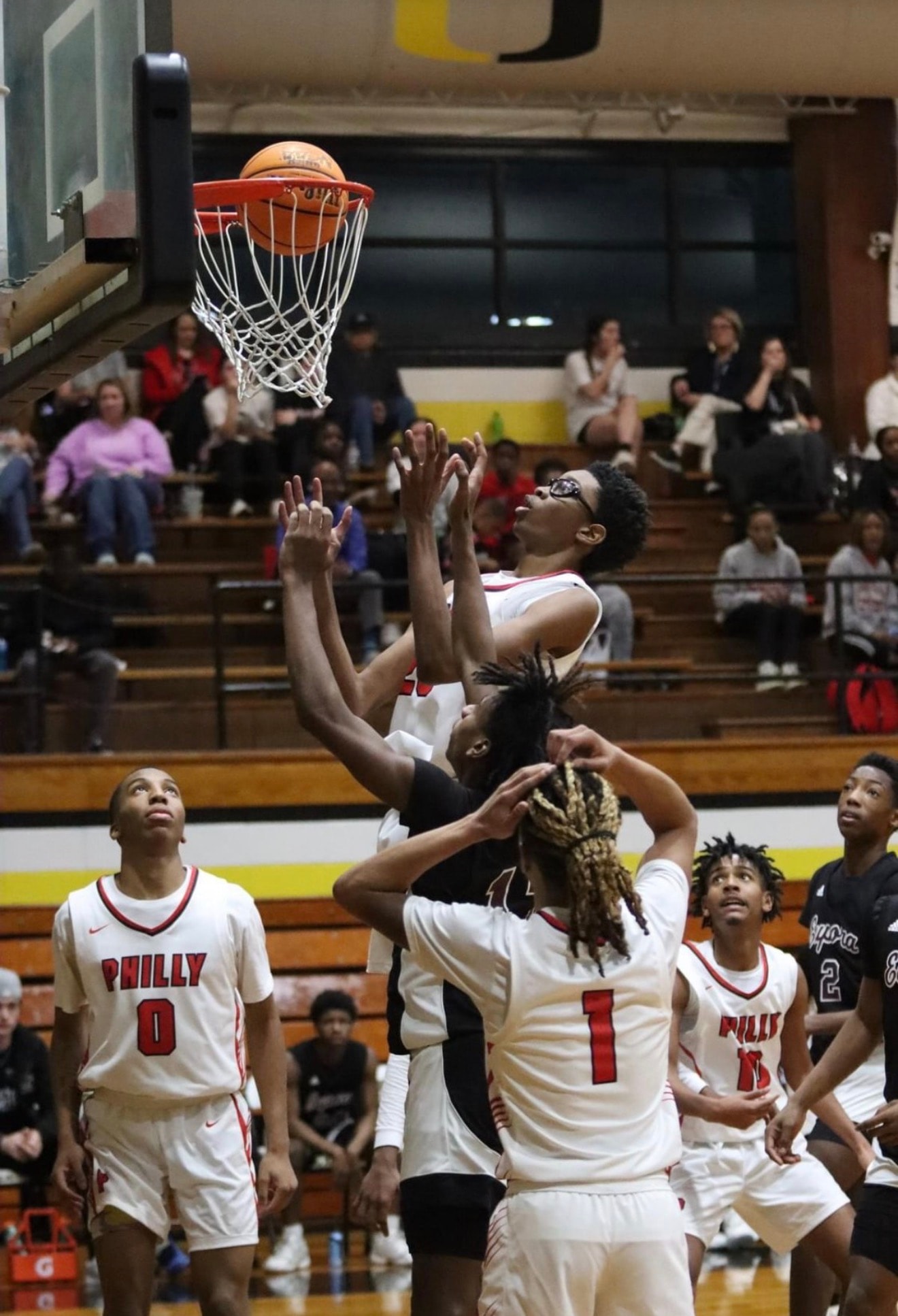 Basketball player taking a shot during a game